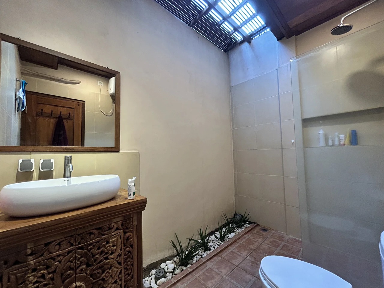 Tucked-Away 3BR Joglo w/ Rooftop Patio
