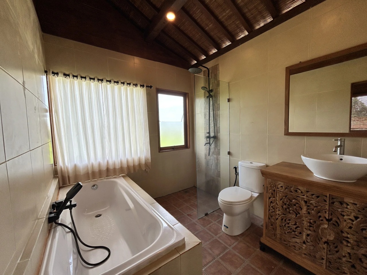 Tucked-Away 3BR Joglo w/ Rooftop Patio