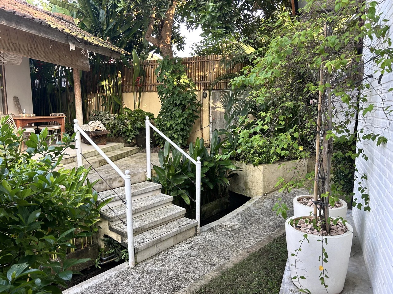 Beach house with lush garden