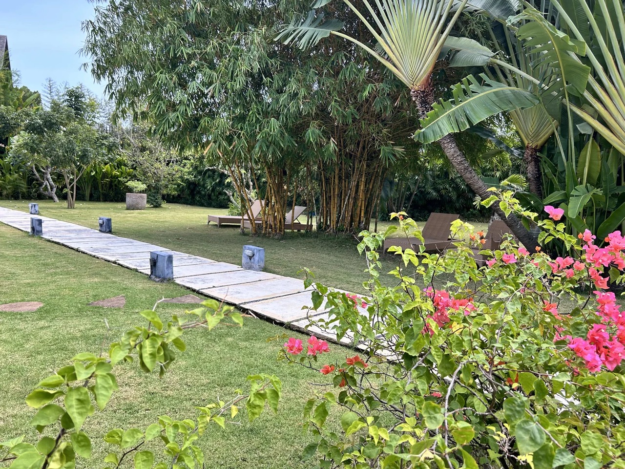 Beach house with lush garden