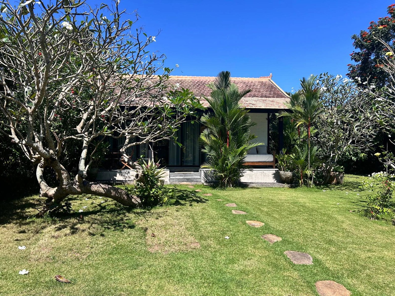 Beach house with lush garden